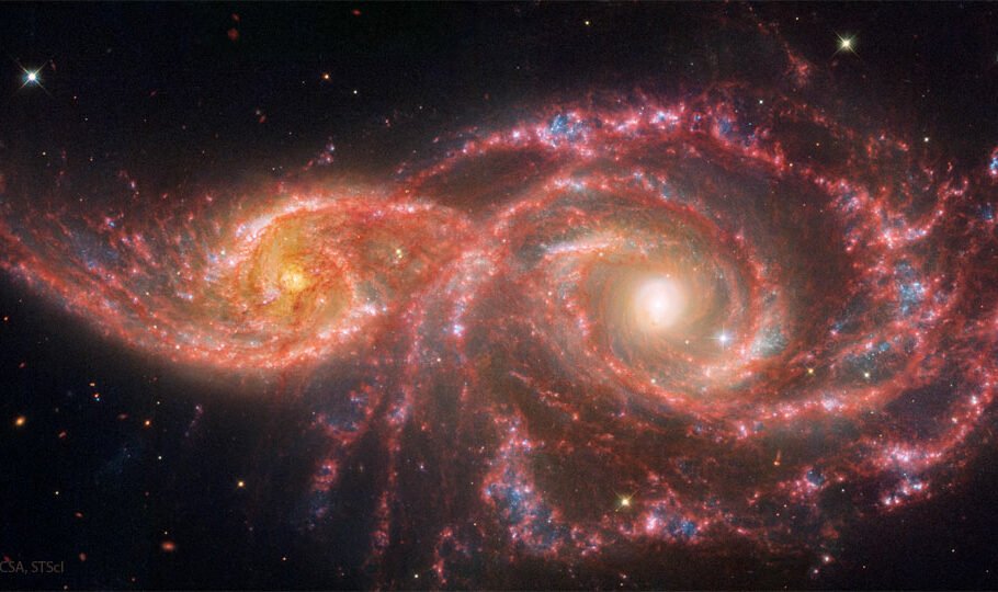 تصویر روز ناسا: «چشمان غرق در خون»؛ کهکشان‌های مارپیچی NGC 2207 و IC 2163